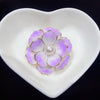 Emma II Ruffled Peony Enamel Brooch - A round, elegant brooch featuring an array of ruffled petals clustered around a small round pearl.
