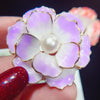 Emma II Ruffled Peony Enamel Brooch - A round, elegant brooch featuring an array of ruffled petals clustered around a small round pearl.