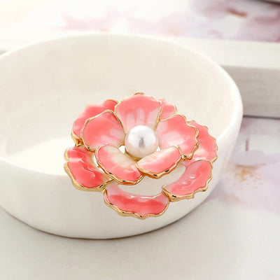 Emma II Ruffled Peony Enamel Brooch - A round, elegant brooch featuring an array of ruffled petals clustered around a small round pearl.