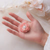 Emma II Ruffled Peony Enamel Brooch - A round, elegant brooch featuring an array of ruffled petals clustered around a small round pearl.