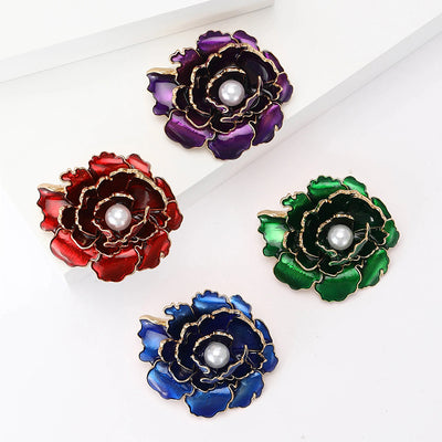 Emma Ruffled Peony Enamel Brooch - A round, elegant brooch featuring an array of ruffled petals clustered around a small round pearl.