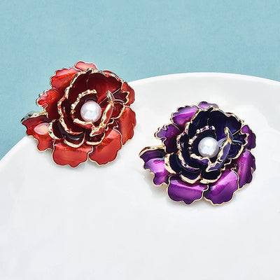Emma Ruffled Peony Enamel Brooch - A round, elegant brooch featuring an array of ruffled petals clustered around a small round pearl.