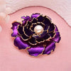 Emma Ruffled Peony Enamel Brooch - A round, elegant brooch featuring an array of ruffled petals clustered around a small round pearl.