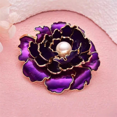 Emma Ruffled Peony Enamel Brooch - A round, elegant brooch featuring an array of ruffled petals clustered around a small round pearl.