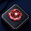 Emma Ruffled Peony Enamel Brooch - A round, elegant brooch featuring an array of ruffled petals clustered around a small round pearl.