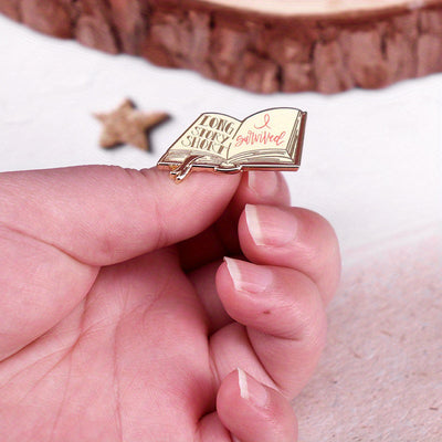 The "Long Story Short, I Survived" Enamel Pin is a small, stylish brooch featuring a stylised book with the text "Long Story Short, I Survived". Make of that what you will! Grab yours today!