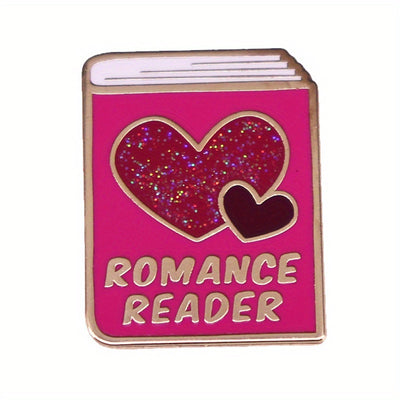 The "Romance Reader" Enamel Pin is a simple but elegant design, featuring a pink book outlined in gold, adorned with hearts. Perfect for expressing your love of the romance genre to all. Grab yours today!