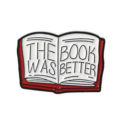 The "The Book Was Better" Enamel Pin features a stylised red book with large text loudly proclaiming just how much better the book was, as every book-lover knows.