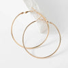 Essentials Steel Hoop Earrings - Fabulous large basic hoop earrings available in gold, rose gold, silver, or black enamel, and six different sizes ranging from 30mm to 80mm.