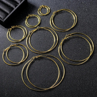 Essentials Steel Hoop Earrings - Fabulous large basic hoop earrings available in gold, rose gold, silver, or black enamel, and six different sizes ranging from 30mm to 80mm.