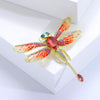 Etain II Dragonfly Brooch - A large stylized dragonfly brooch with colourful enamel painted wings and sparkling crystals.