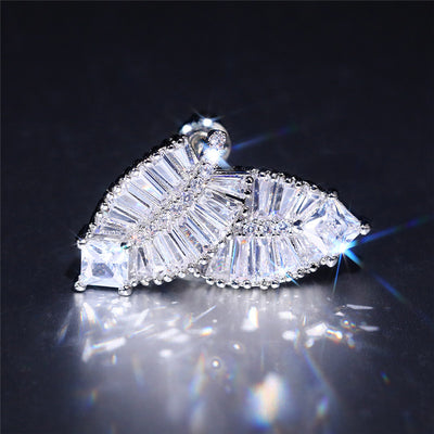 Felicity Luxury Crystal Fern Stud Earrings - Small, delicate stud earrings crafted from shimmering white quartz crystals, arranged to look like crystalline fern fronds.