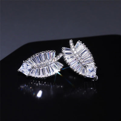 Felicity Luxury Crystal Fern Stud Earrings - Small, delicate stud earrings crafted from shimmering white quartz crystals, arranged to look like crystalline fern fronds.