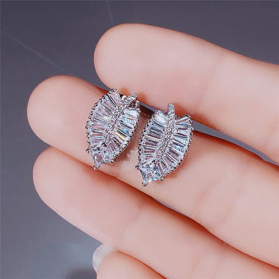 Felicity Luxury Crystal Fern Stud Earrings - Small, delicate stud earrings crafted from shimmering white quartz crystals, arranged to look like crystalline fern fronds.