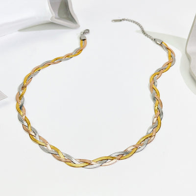 Gaelyn Tricolour Braided Snake Chain Bracelet & Necklace Set - A stylish metal jewellery set made from alternating strands of yellow, white, and rose gold, braided together into a tricolour necklace and bracelet.