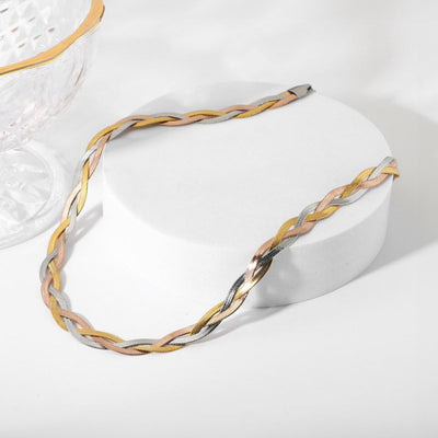 Gaelyn Tricolour Braided Snake Chain Bracelet & Necklace Set - A stylish metal jewellery set made from alternating strands of yellow, white, and rose gold, braided together into a tricolour necklace and bracelet.
