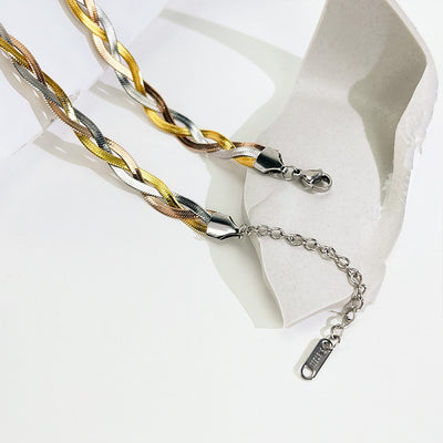 Gaelyn Tricolour Braided Snake Chain Bracelet & Necklace Set - A stylish metal jewellery set made from alternating strands of yellow, white, and rose gold, braided together into a tricolour necklace and bracelet.