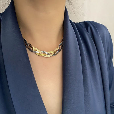 Gaelyn Tricolour Braided Snake Chain Bracelet & Necklace Set - A stylish metal jewellery set made from alternating strands of yellow, white, and rose gold, braided together into a tricolour necklace and bracelet.