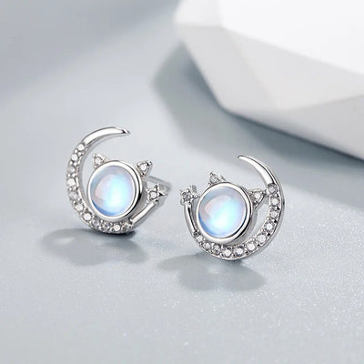 The Galactic Gatto Moonstone Cat Set - A very delicate cat-themed set featuring a small round moonstone for the cat's head, with stylised cat ears, stars, and moons.