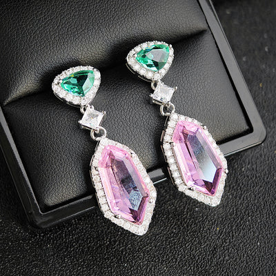 Georgia Geometric Crystal Dangle Earrings - Medium-sized dangle earrings featuring a small green topaz on the lobe, large pink topaz hanging below, and lots of lovely, small white crystals.
