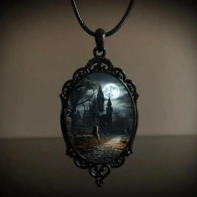 Gothic Castle Cameo Necklace - A large gothic glass cabochon featuring an image of a spooky castle against a cloudy night sky with a huge full moon.