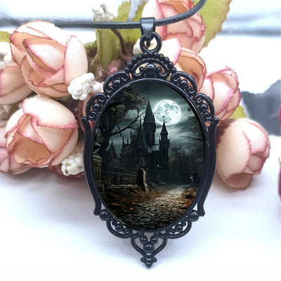 Gothic Castle Cameo Necklace - A large gothic glass cabochon featuring an image of a spooky castle against a cloudy night sky with a huge full moon.