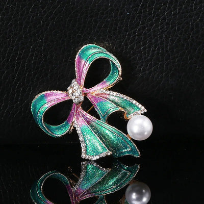 Grace Ribbon Bow Brooch - A lovely feminine brooch shaped like a stylised pink-and-green sparkly ribbon tied in a bow.