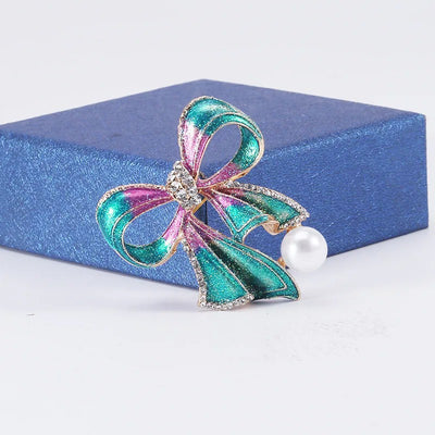 Grace Ribbon Bow Brooch - A lovely feminine brooch shaped like a stylised pink-and-green sparkly ribbon tied in a bow.