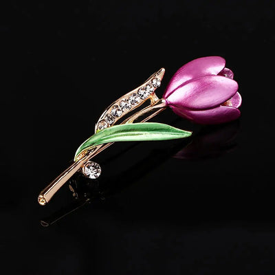 The Gretchen Enamel Tulip Brooch - A tall, slender enamel flower brooch with a colourful flower head and delicate round crystals along one of the leads.