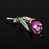 The Gretchen Enamel Tulip Brooch - A tall, slender enamel flower brooch with a colourful flower head and delicate round crystals along one of the leads.