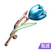 The Gretchen Enamel Tulip Brooch - A tall, slender enamel flower brooch with a colourful flower head and delicate round crystals along one of the leads.