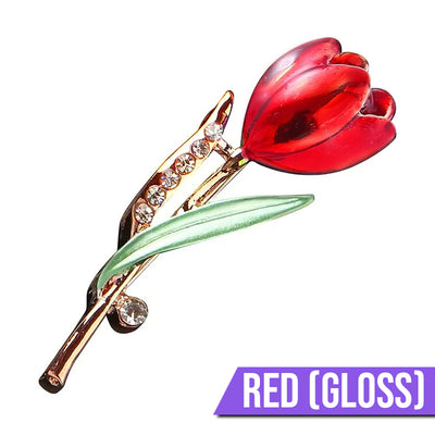 The Gretchen Enamel Tulip Brooch - A tall, slender enamel flower brooch with a colourful flower head and delicate round crystals along one of the leads.