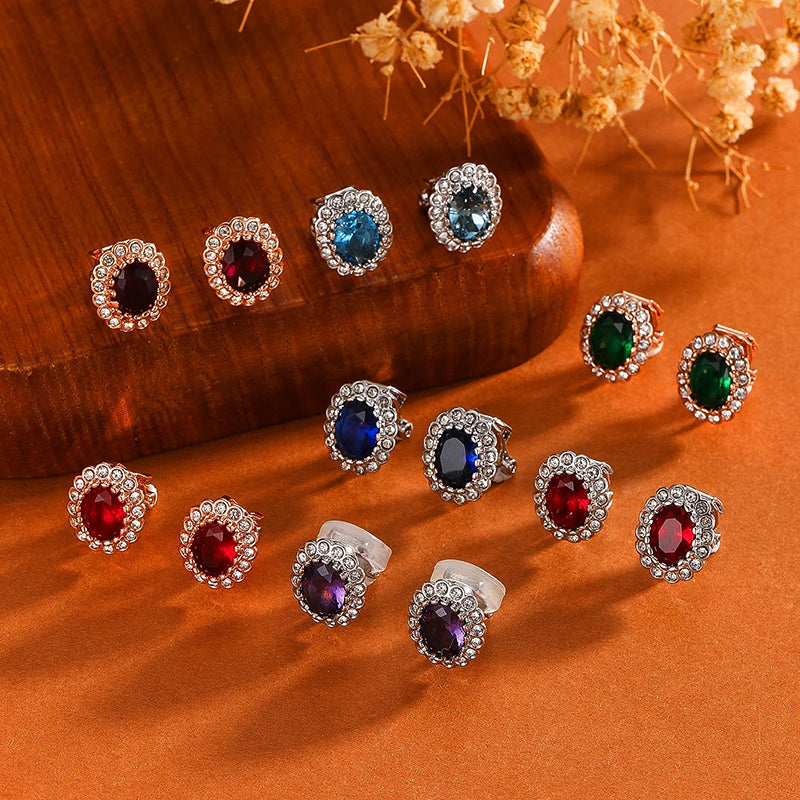 Hailee Entourage Clip Earrings - Ultra-petite, vintage-style clip-on earrings featuring a single coloured stone surrounded by 16 smaller stones.