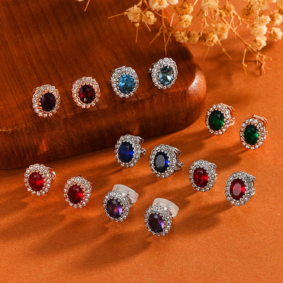 Hailee Entourage Clip Earrings - Ultra-petite, vintage-style clip-on earrings featuring a single coloured stone surrounded by 16 smaller stones.
