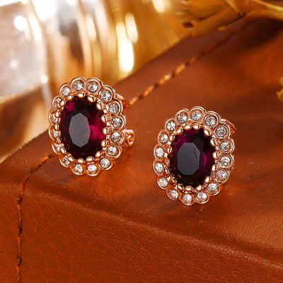 Hailee Entourage Clip Earrings - Ultra-petite, vintage-style clip-on earrings featuring a single coloured stone surrounded by 16 smaller stones.
