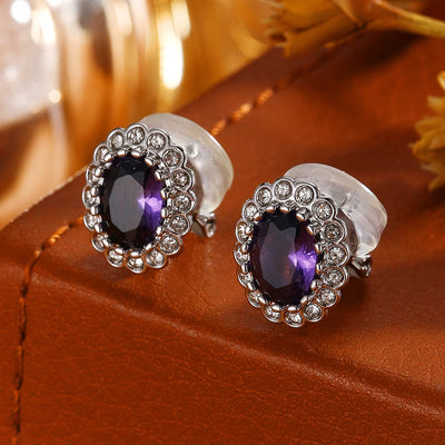 Hailee Entourage Clip Earrings - Ultra-petite, vintage-style clip-on earrings featuring a single coloured stone surrounded by 16 smaller stones.
