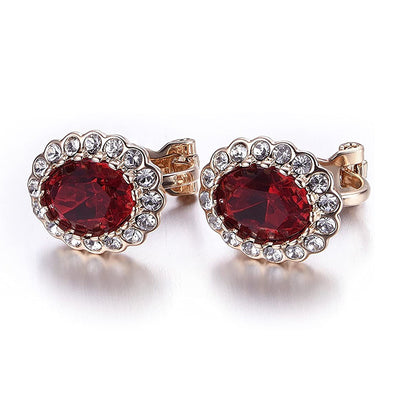 Hailee Entourage Clip Earrings - Ultra-petite, vintage-style clip-on earrings featuring a single coloured stone surrounded by 16 smaller stones.