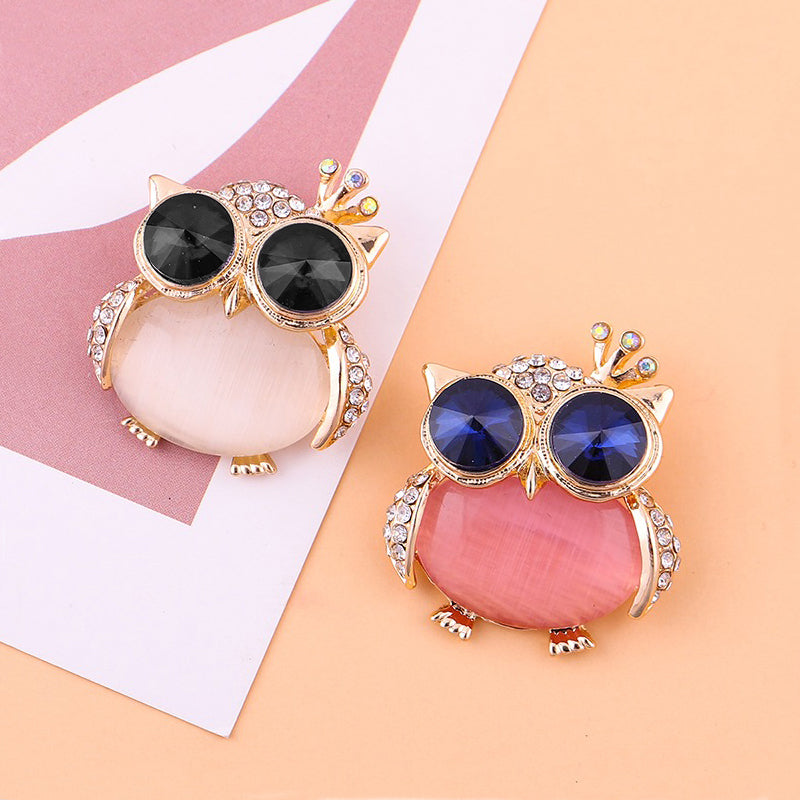 Happily Hootiful Chonky Owl Brooch - An adorable chubby owl-themed brooch, available in pink or white pearl.