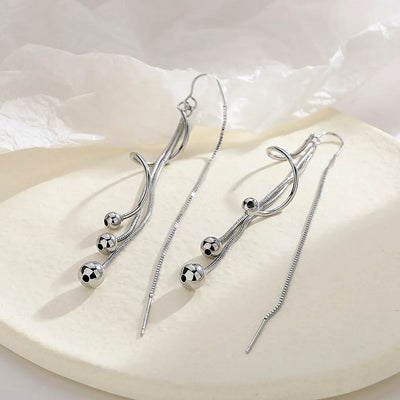 Harper Faux Threader Dangle Earrings  Long, interesting strand earrings with a faux threader at the back to add some extra movement.