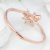 Helios Hinged Bangle - A beautiful bracelet with colourful crystals in an abstract starburst pattern.