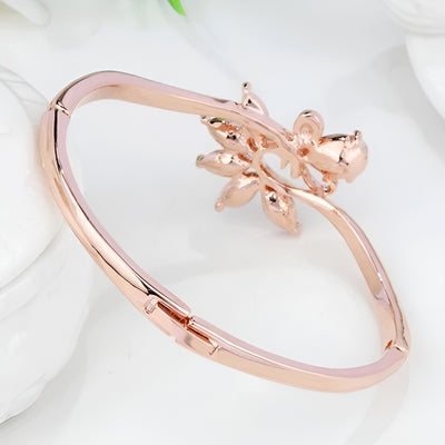 Helios Hinged Bangle - A beautiful bracelet with colourful crystals in an abstract starburst pattern.