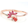 Helios Hinged Bangle - A beautiful bracelet with colourful crystals in an abstract starburst pattern.