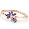 Helios Hinged Bangle - A beautiful bracelet with colourful crystals in an abstract starburst pattern.