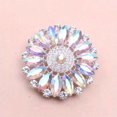 Ilona Iridescent Crystal Blossom Brooch - A large, circular brooch featuring an assortment of white quartz and marquise cut iridescent stones.