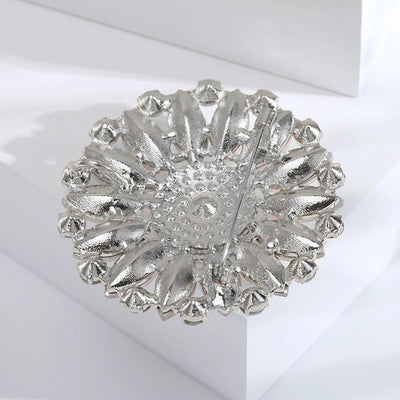 Ilona Iridescent Crystal Blossom Brooch - A large, circular brooch featuring an assortment of white quartz and marquise cut iridescent stones.
