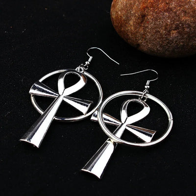 Isis Gothic Ankh Earrings - A pair of chunky silver-toned ankh earrings with a  round matching loop.