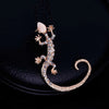 Itty Bitty Lizard Ear Cuff - A cute lizard or gecko themed ear cuff, an earring that cuddles around the ear.