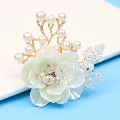 Jaelyn Pearlescent Cluster Brooch - A large, elegant flower-shaped brooch with pearlescent resin petals and lots of little crystals and pearls.