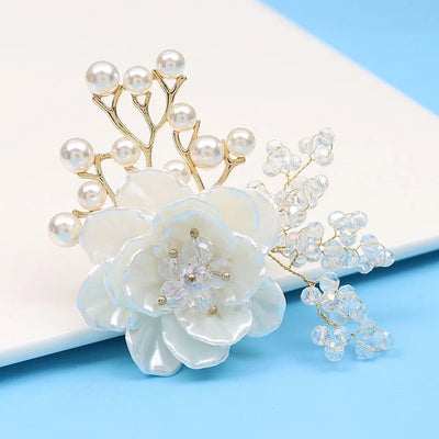 Jaelyn Pearlescent Cluster Brooch - A large, elegant flower-shaped brooch with pearlescent resin petals and lots of little crystals and pearls.