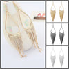 Jahzara Tassel Earrings - Long stylish statement dangles, featuring a hollow teardrop shape with tassels strung off it.